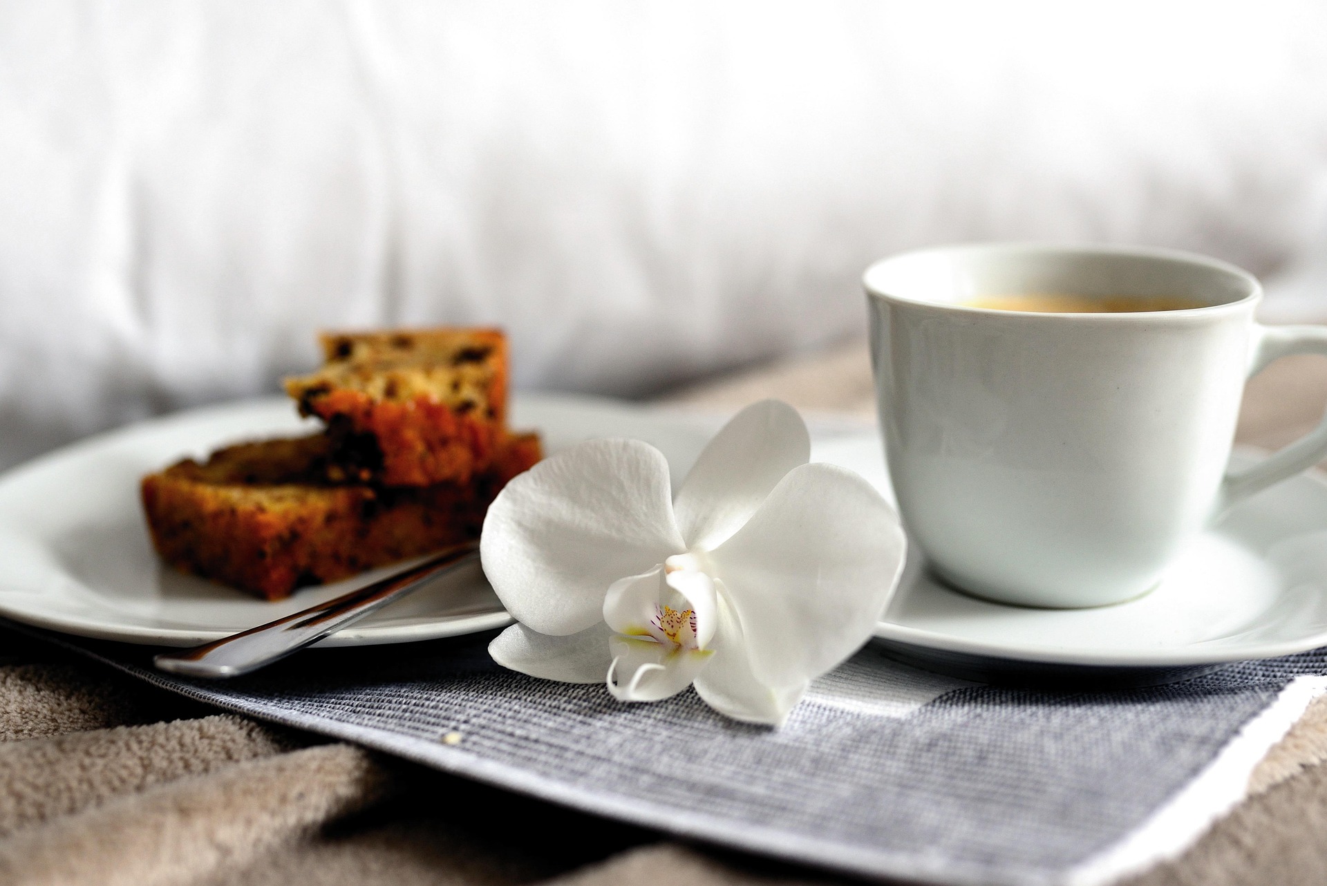 Coffee service with pastries on a breakfast tray